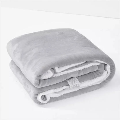 Ultra soft sherpa fleece blanket folded on bed providing cozy warmth and comfort