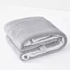 Ultra soft sherpa fleece blanket folded on bed providing cozy warmth and comfort