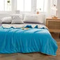 Ultra soft sherpa fleece blanket folded on bed providing cozy warmth and comfort