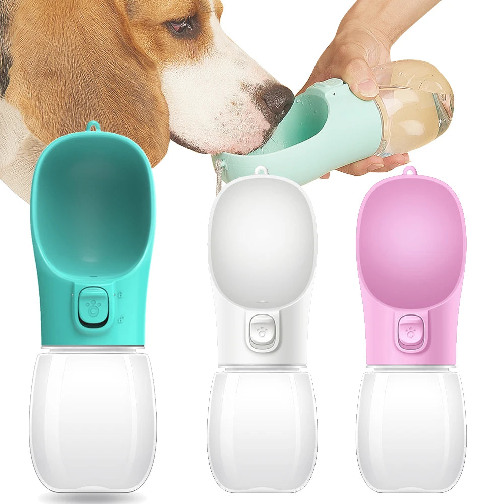 Portable leak-proof dog water bottle with built-in drinking cup used during outdoor walk