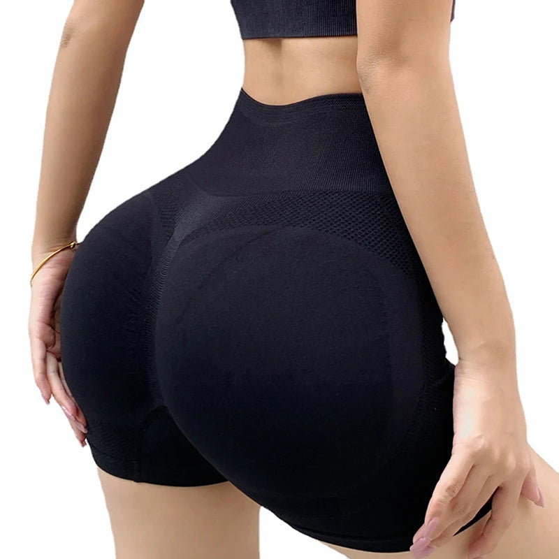Seamless high waisted scrunch butt workout shorts providing sculpting and supportive fit during exercise